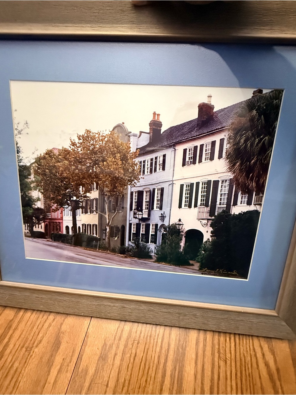 Framed Coastal Street Art Print in Light Blue Mat